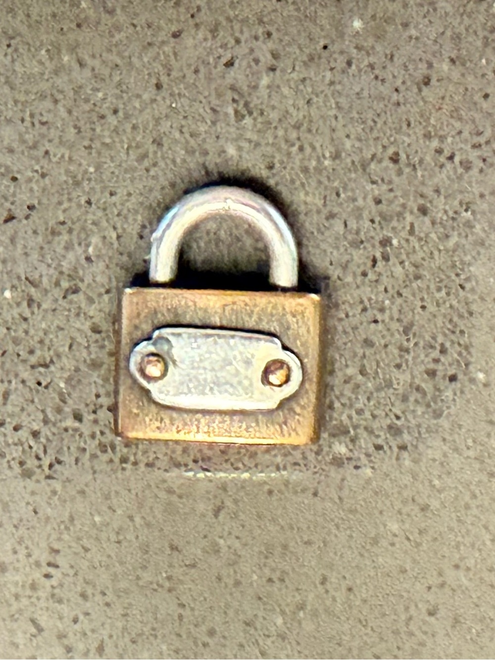 James Avery retired bronze and sterling silver charm/pendant.